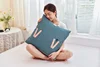 Multifunctional car pillow is covered with sleeves and can be worn on sofa legs to keep warm and prevent kicking. 3