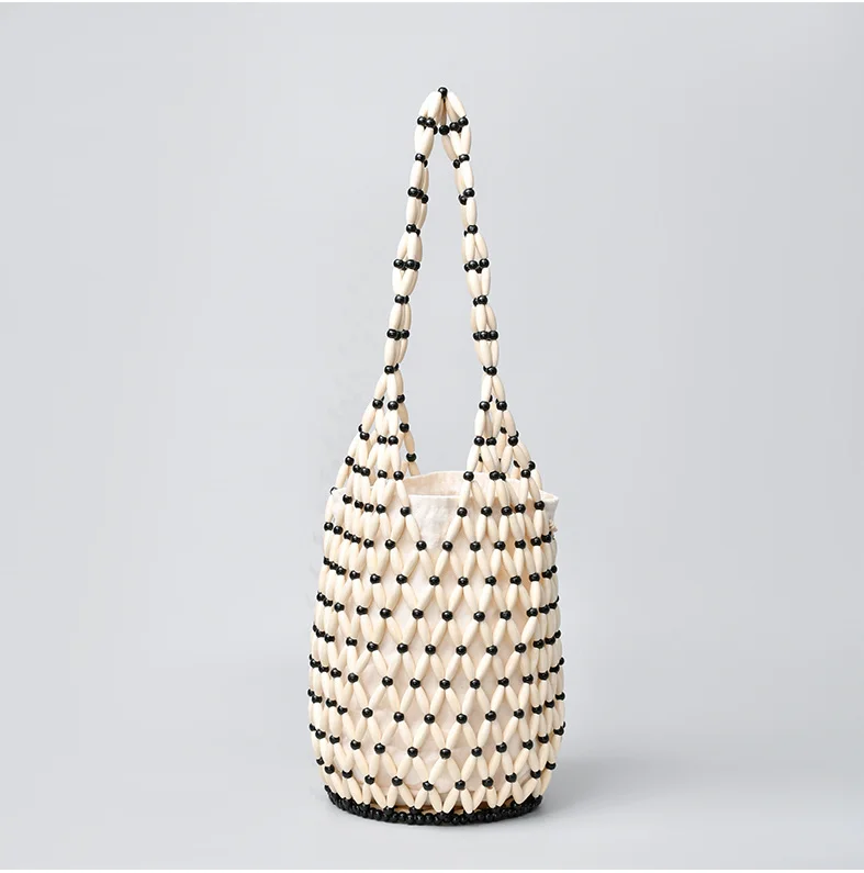 Borsa a spalla donna intrecciata con perline in legno borsa a secchiello_voghion.com