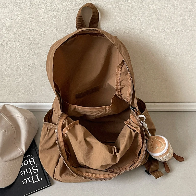 Lightweight folding backpack suitable for hiking, traveling, and outdoor adventures - adjustable shoulder straps, large capacity