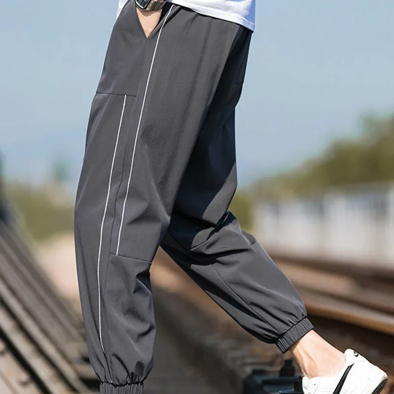 2023 New Summer Minimalist Fashion Trend Ice Silk Leggings Versatile Casual Solid Color Loose Fitting Men's Temperament Pants