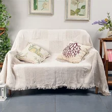 Cobertura tecida exterior da cama da tapeçaria com borlas cobertura branca do sofá da grade boho do jacquard feito malha do algodão