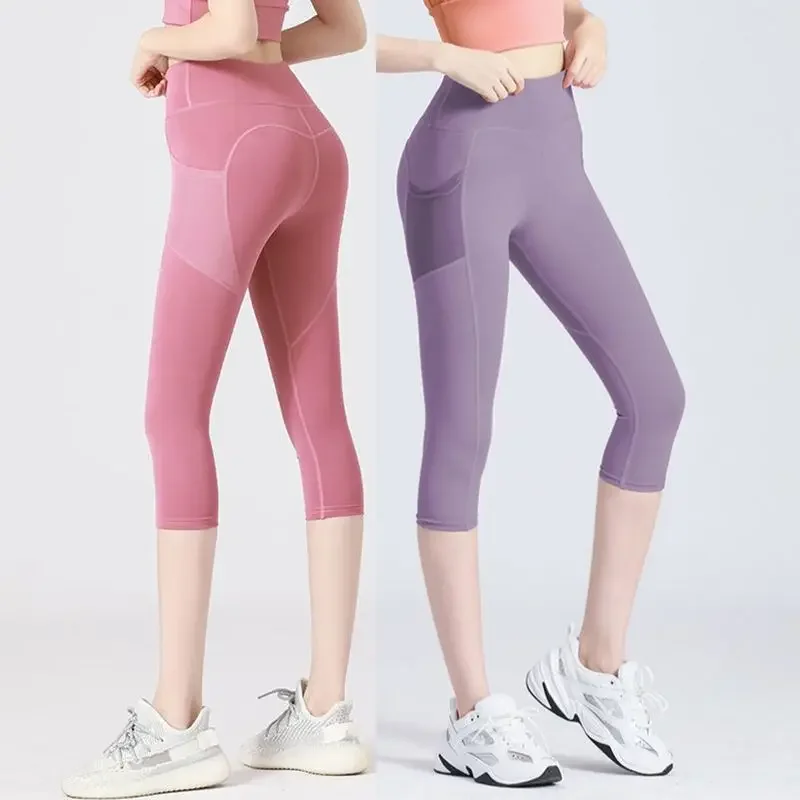 

Seven-point fitness pants women's belly-holding peach liquid hip-lifting elastic tight-fitting yoga high-waist running sports