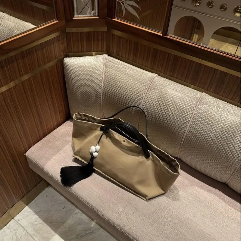 Einfache exquisite Quaste Schlüsselanhänger Damenmode Accessoires natürliche Muschel Tasche Schnalle böhmischen Anhänger Charme Schmuck Geschenk – Detail 10