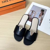 2024 summer new V-shaped metal decoration flat bottomed beach women's fashionable slippers - Image 3