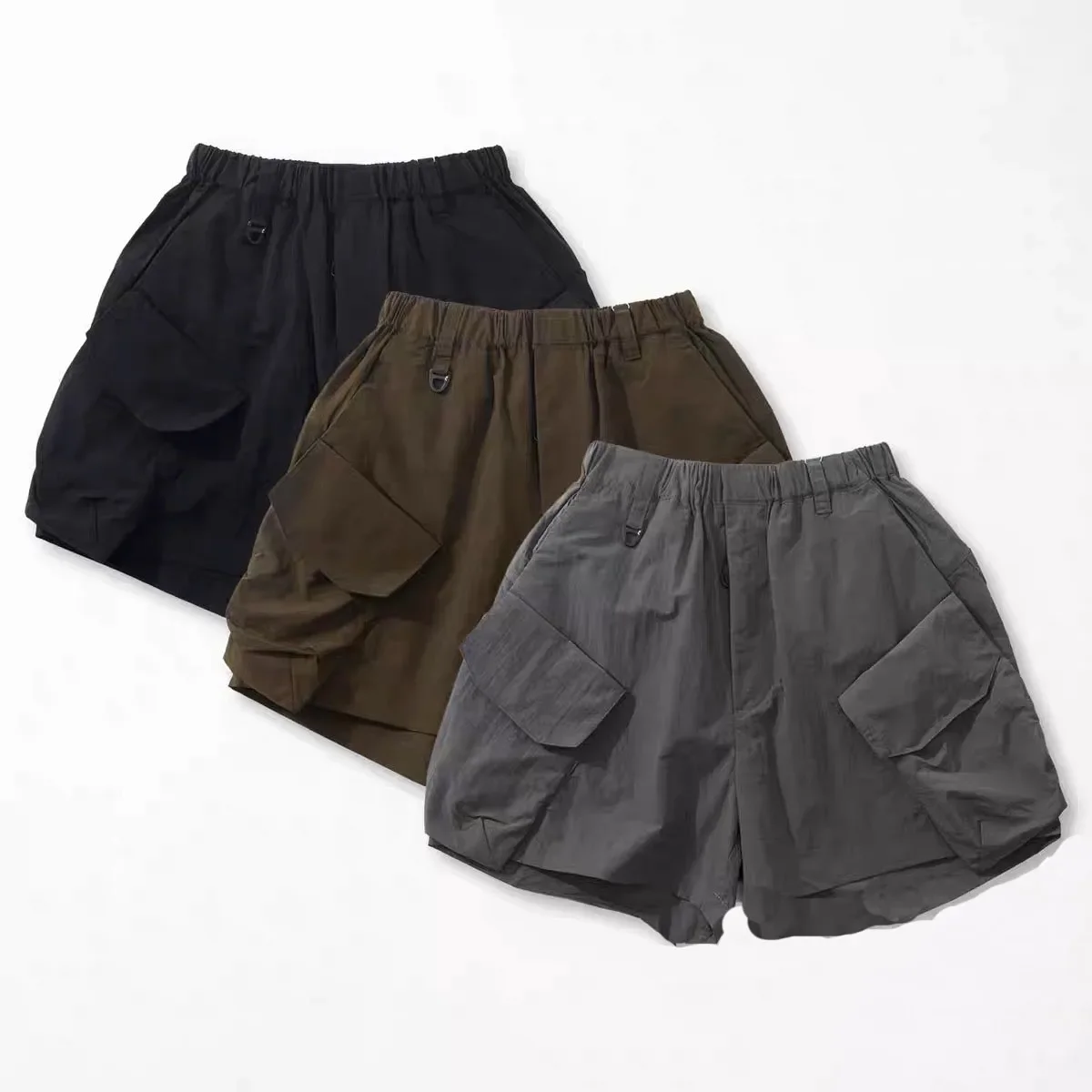 New Arrival COMFY Functional Waterproof Oblique Pocket Shorts CMF Casual Loose Outdoor Capris 23SS