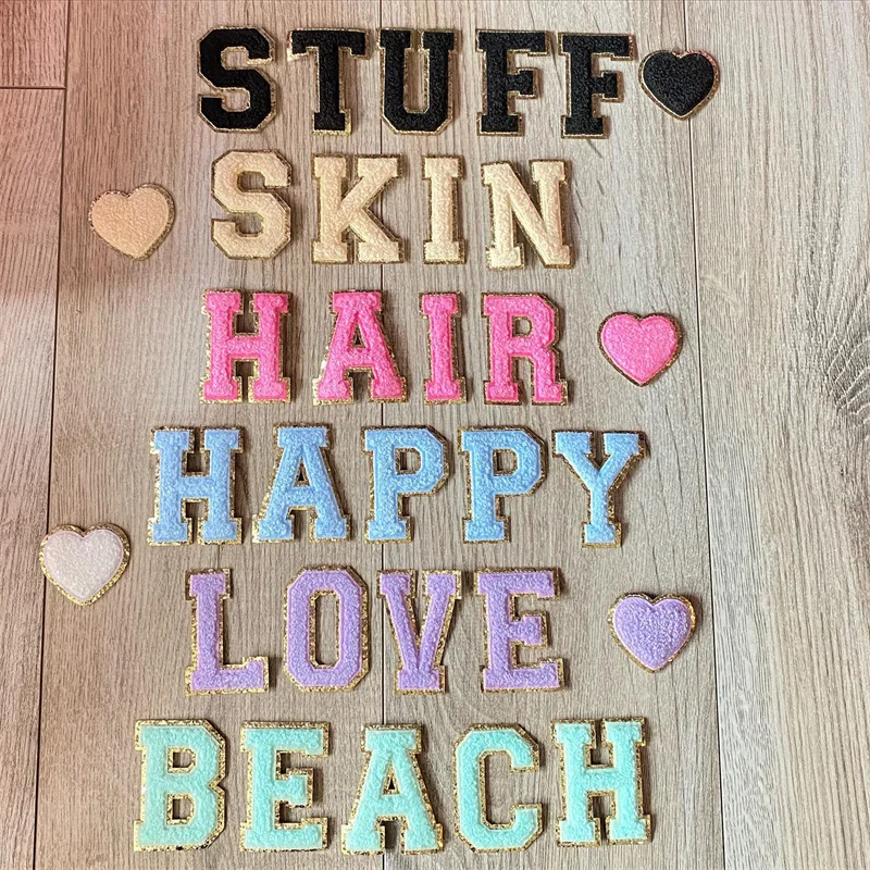 Yellow, black, and rose pink embroidered towel letter patches A–Z (8cm)