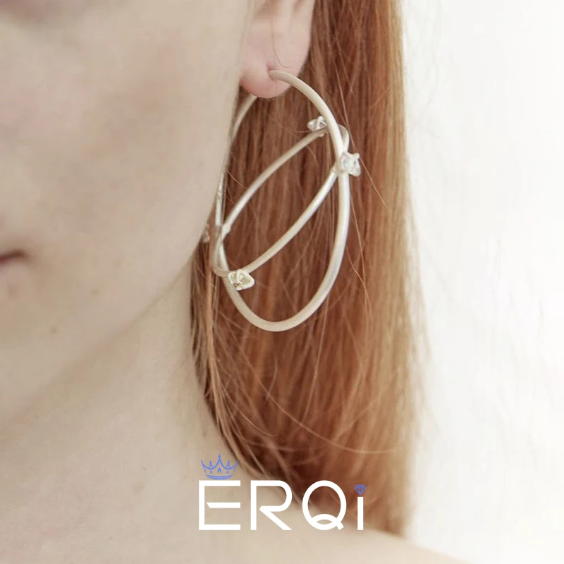 

The New Double-Loop Rotating Earrings For 2024 Are A Party Gift For Women's Cyberpunk Style Copper Alloy Jewelry