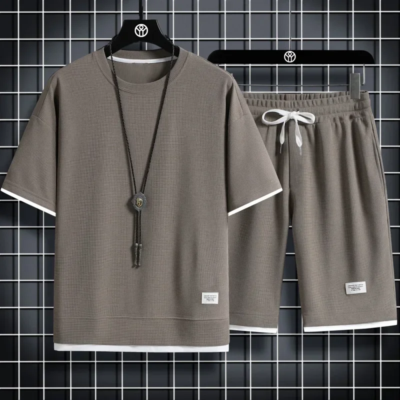 Men's high qualityNew Summer Round Neck Short Sleeve Men Casual Sports Set Loose T-shirt Shorts Waffle Style Clothing