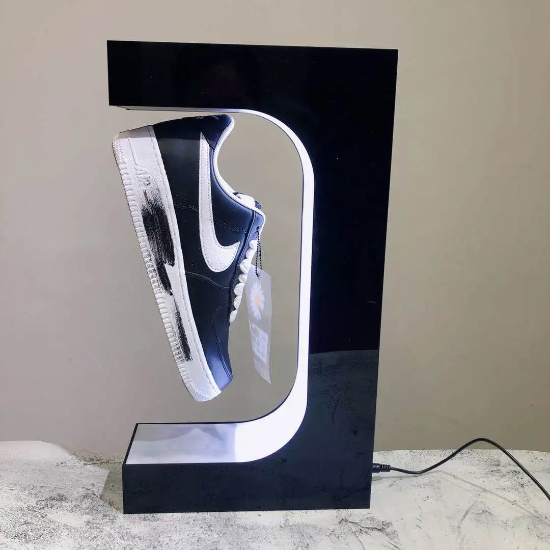 https://ae01.alicdn.com/kf/Sae468b7fac744eeb9ff7fe56d8770340J/Magnetic-Floating-Shoe-Display-Stand-Levitation-Sneaker-Holder-With-LED-Light-for-Advertising-Store-levitating-shoe.jpg