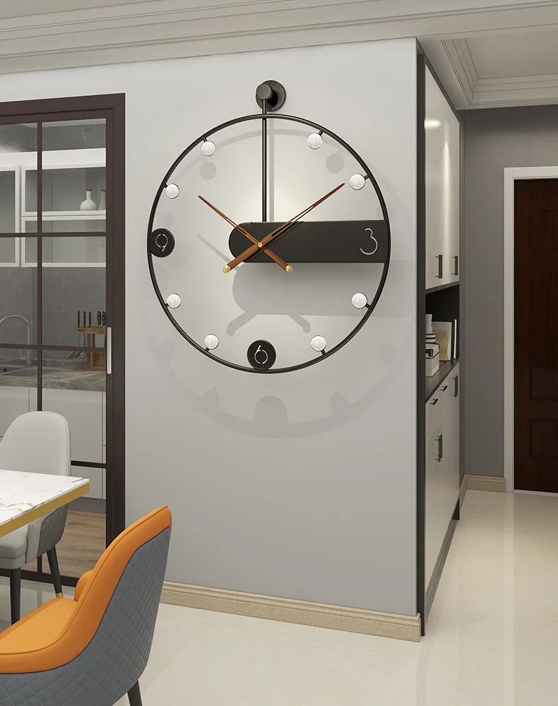 A modern dining room with a Circular Light Wall Clock hanging on the wall.