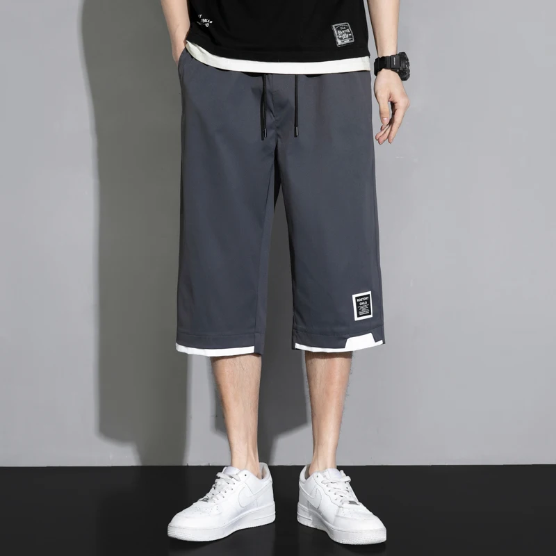 Summer New Solid Color Fashion Elastic Waist Wide Leg Trousers Man High Street Pockets Drawstring All-match Calf-Length Pants