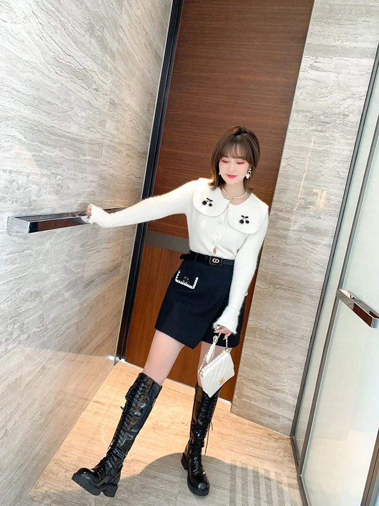 High quality Skirt only Irregular stack build A - Line type cloth skirt with belt the new winter 2022 skater skirt