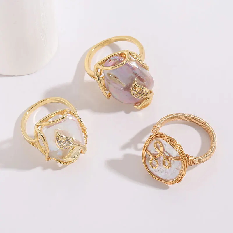

2023 New Fashion Women Elegant Copper Wire Wrapping Irregular Pearl Finger Ring Women Pearl Inlaid Copper Wire Wrapped Leaf Ring