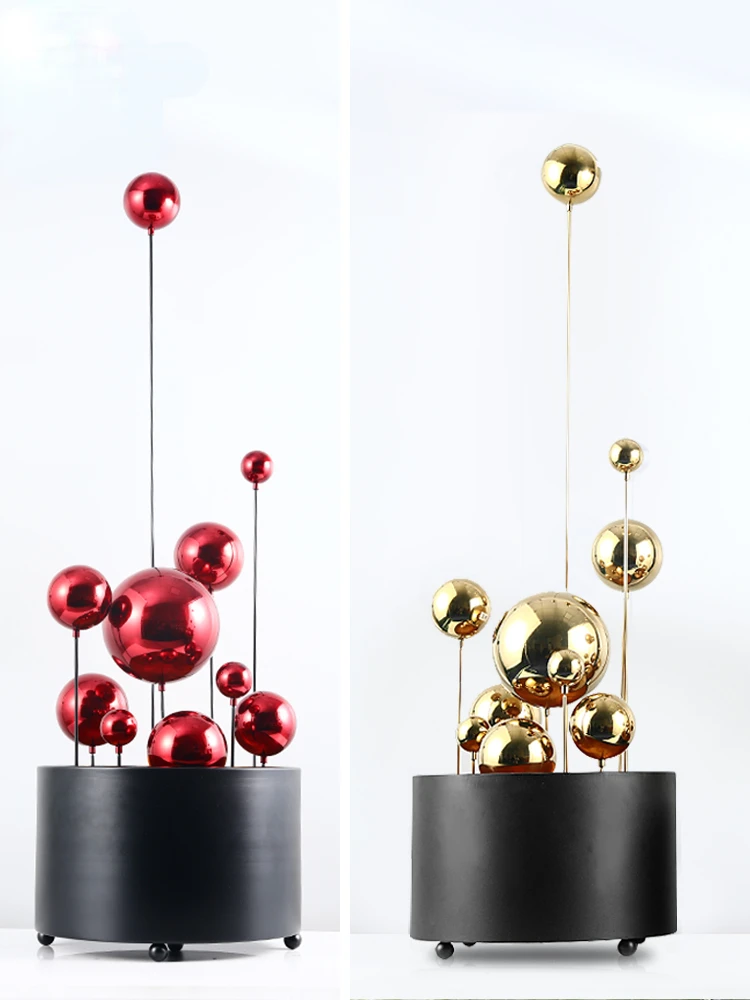 

Simple and modern floor to ceiling colored geometric metal ball light luxury ornaments