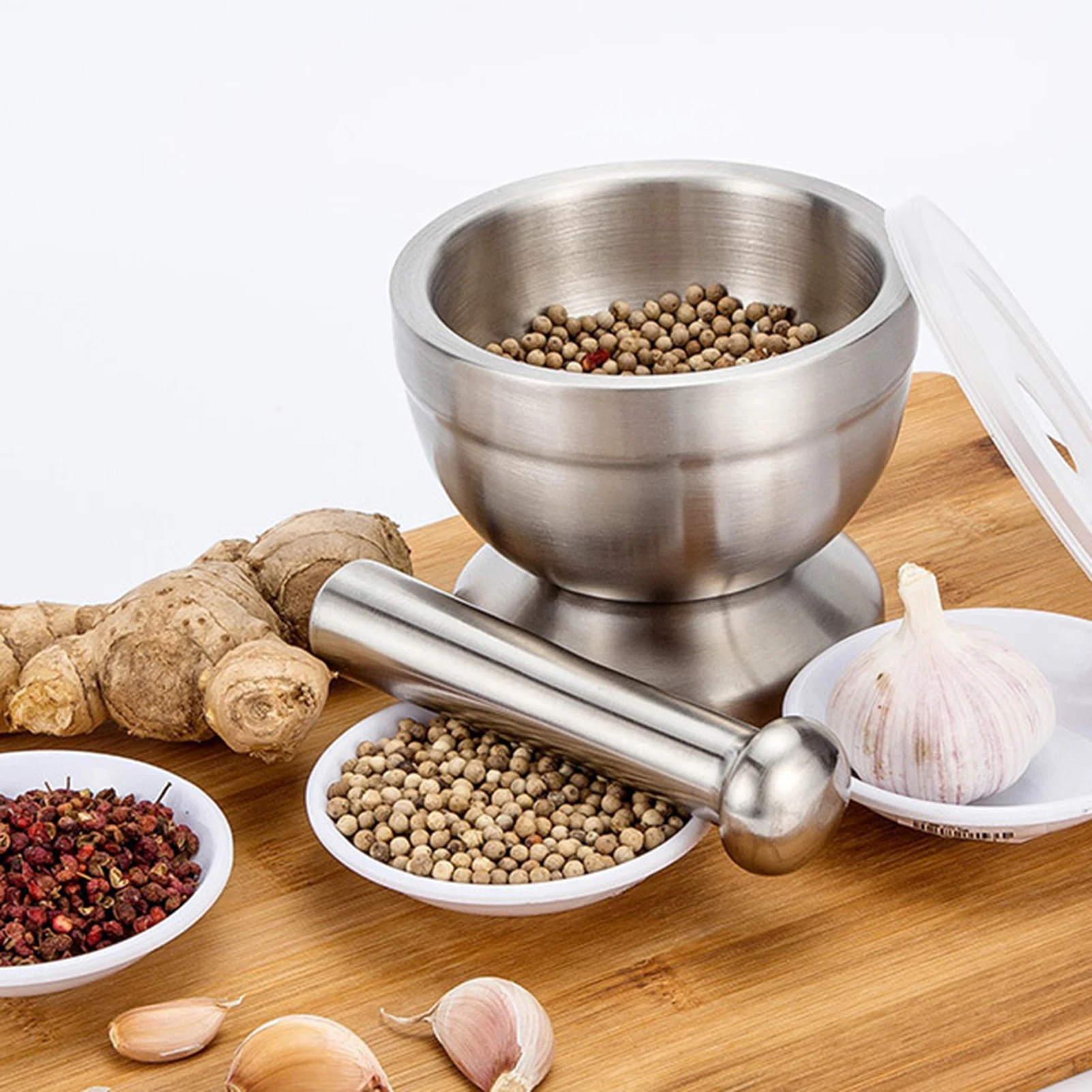 https://ae01.alicdn.com/kf/Saea6fa9febd1482d880c14b9db011e54n/Stainless-Steel-Mortar-and-Pestle-Garlic-Press-Ginger-Crusher-Spices-Masher-for-Spices-Seasonings-Use-Kitchen.jpg