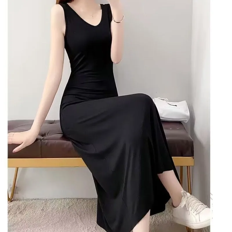 بلوفر نسائي أسود برقبة مستديرة ، ملابس مجوفة ، أحادي اللون ، عطلة غير رسمية ، قطن ، فساتين طويلة سادة للمكتب ، صيف