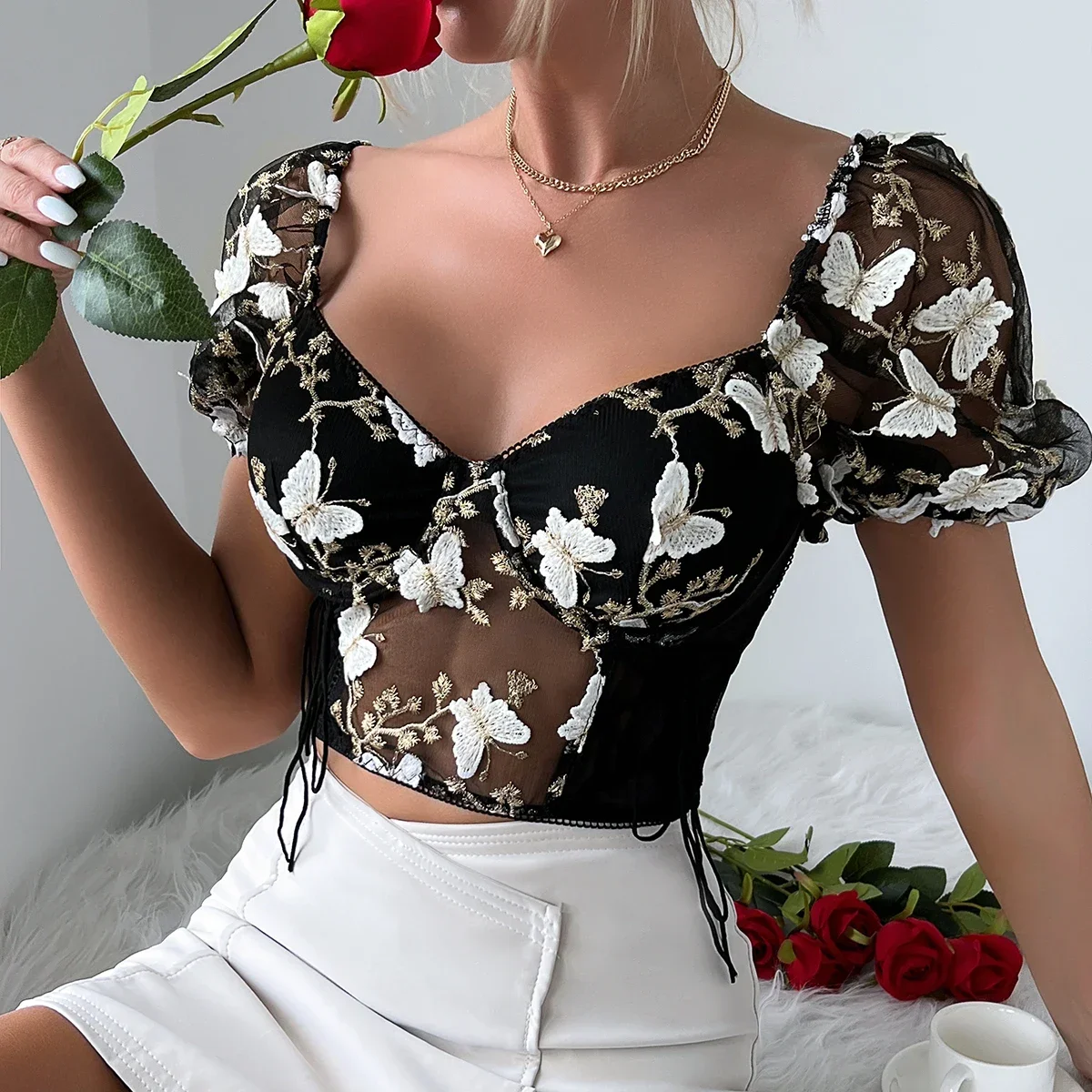 Summer new Hottie backless see-through halter mesh mesh European and American small vest