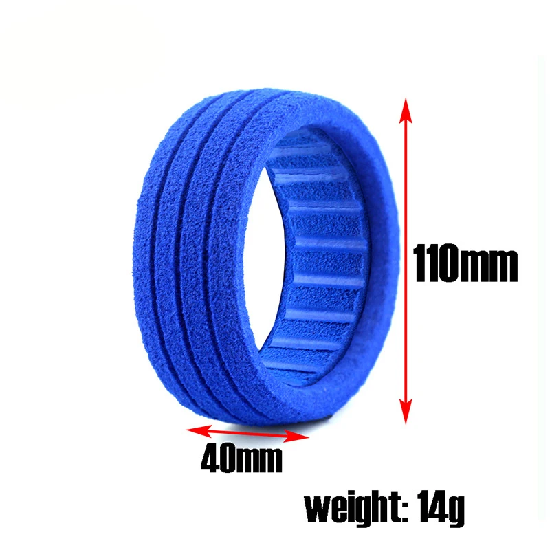 Vue rapprochée des pneus RC 1/8 buggy tout-terrain bleus, motif de bande de roulement visible, protection drone transport