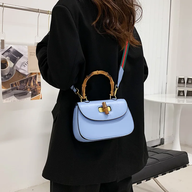 2022 New Retro Bamboo Handle Fashion Portable Saddle Crossbody Bag Designer Handbags High Quality Luxury Brand Satchels