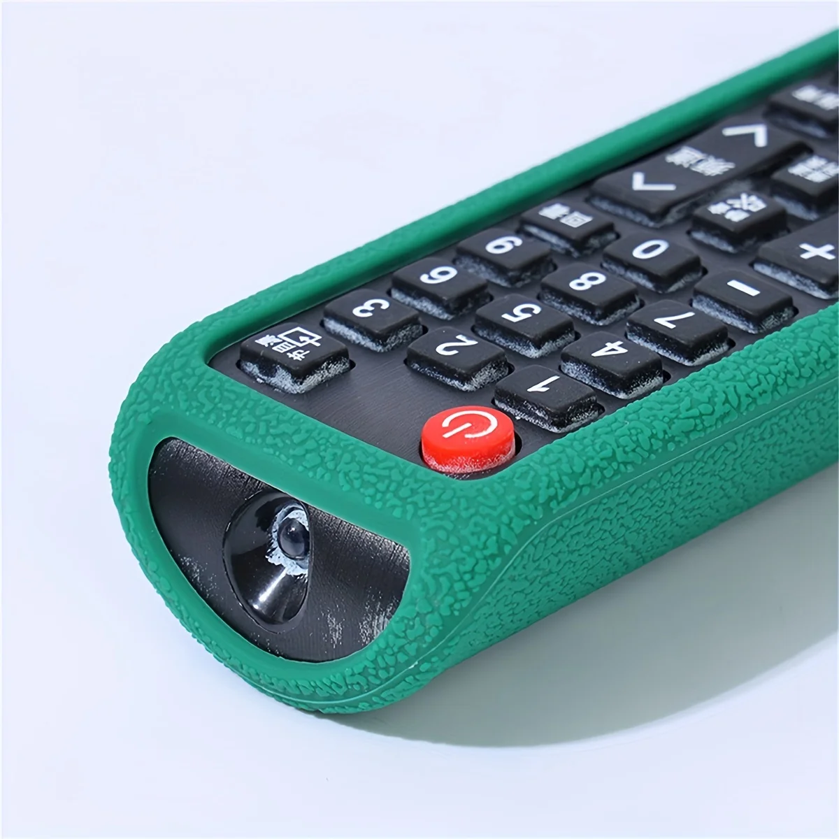 Glowing silicone remote case in low light setting