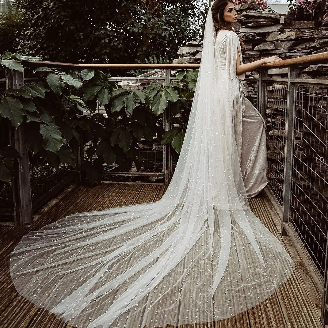 https://ae01.alicdn.com/kf/Saf307f2a7f664f9a8e5e7a88afc152ecO/YouLaPan-V09A-Gorgeous-Bridal-Veil-with-Beaded-Pearl-5M-Cathedral-Length-Wedding-Veil-with-Comb-3m.jpg