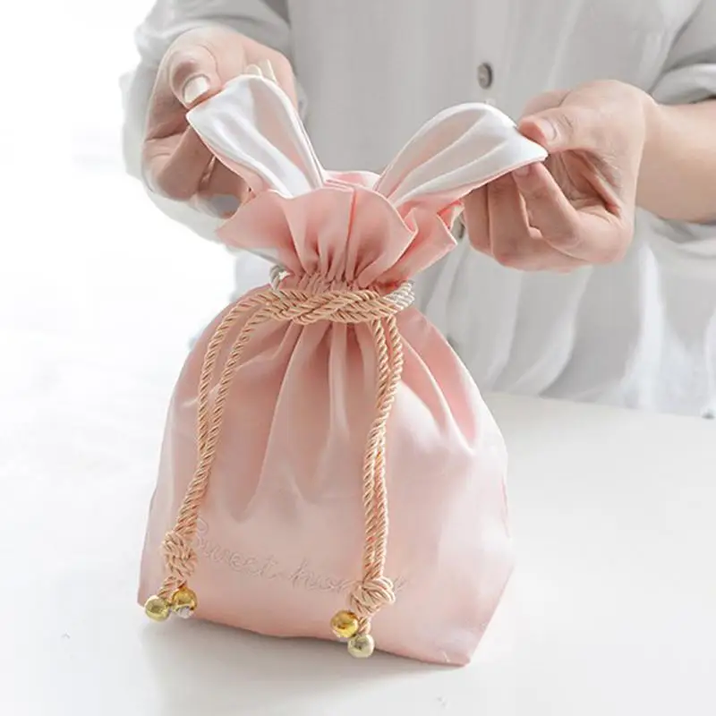 

Portable Cosmetic Storage Bag Cute Rabbit Ear Shape White Plush Balls Highquality Silk Fabric Drawstring Pouch Keys Jewelry Bag