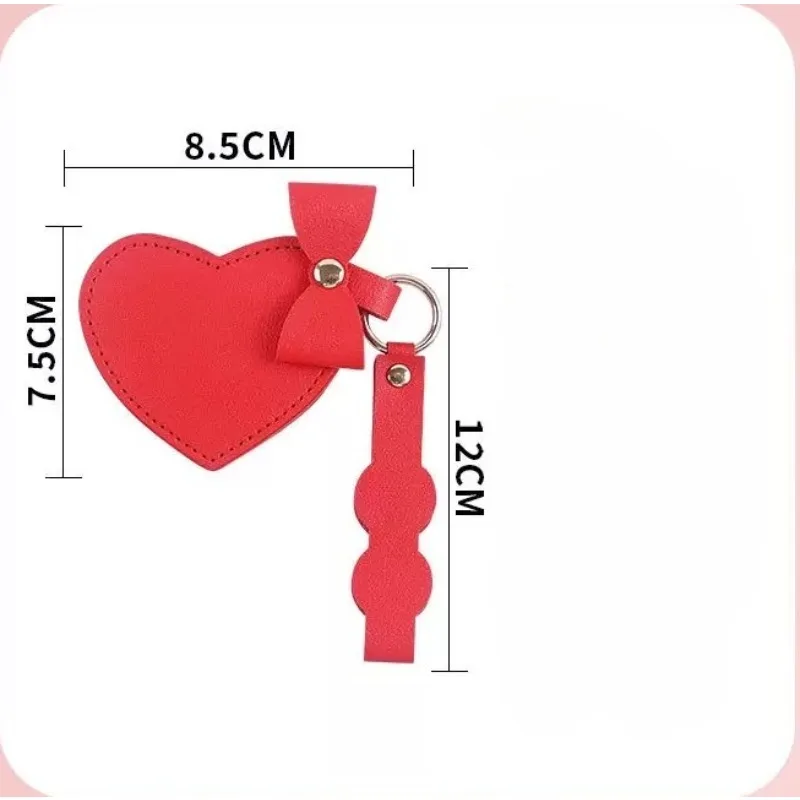 레이저 맞춤형 로고 PU 가죽 하트 모양 리본 메이크업 미러 키체인 펜던트 백팩 액세서리 휴대용 거울 선물