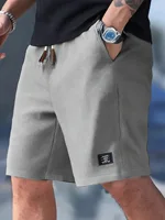 Shorts de sport décontractés pour hommes, à carreaux, amples, longueur genou, style américain, mode sportive urbaine 6