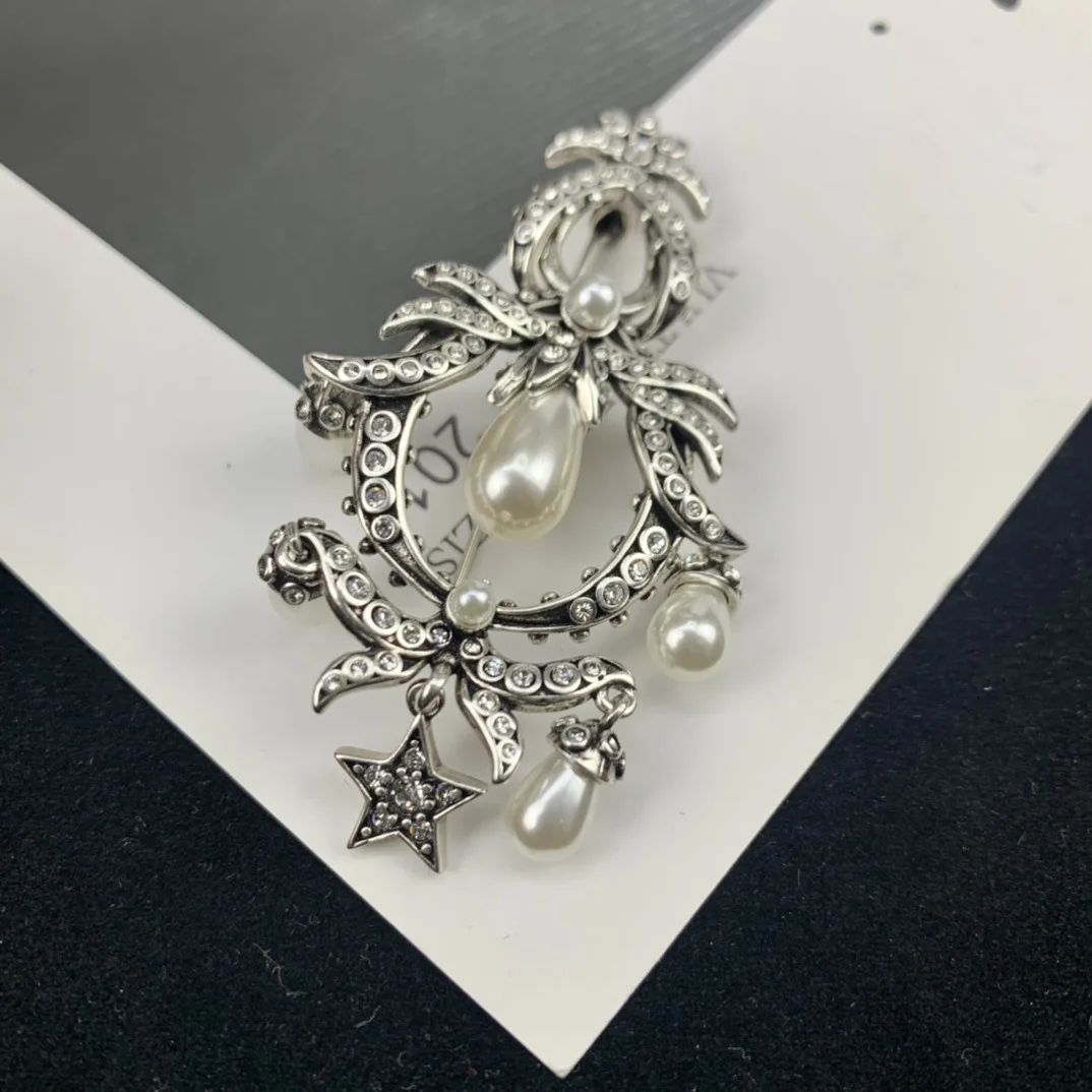 

Geometric pearl star tassel personality retro brooch women
