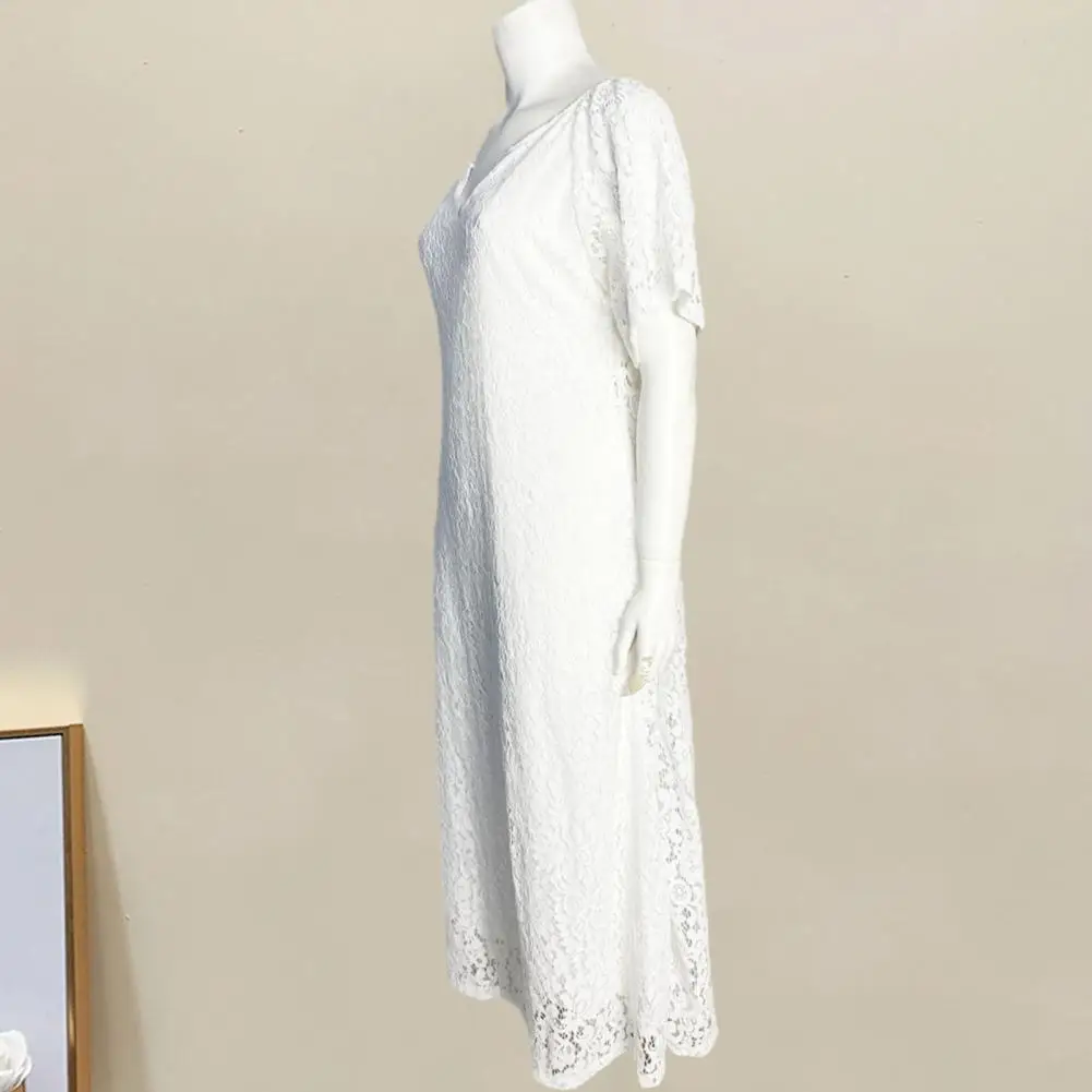 

Women's dress with v-neck, cutout lace sleeves and mesh cutout ruffle hem and high A-line skirt.
