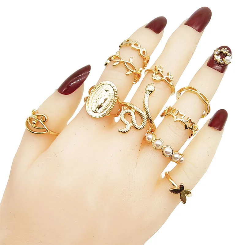 Detailed view of gold rings showcasing love heart designs