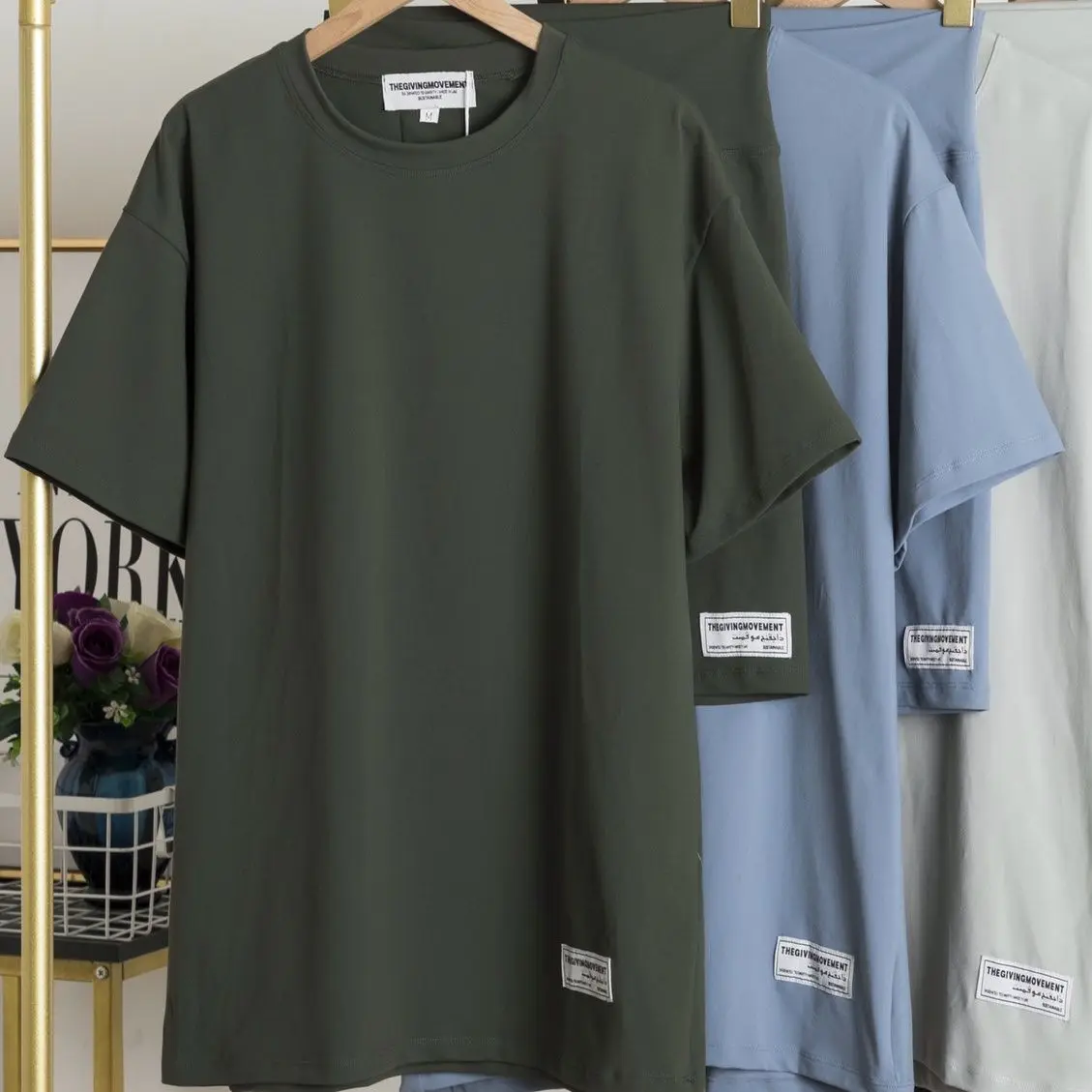 

THEGIVINGMOVEMENT 2023 New Casual Short-sleeved Tshirts Oversized+ Flared Split Leggings Yoga Pant TGM For Women Two Piece Sets