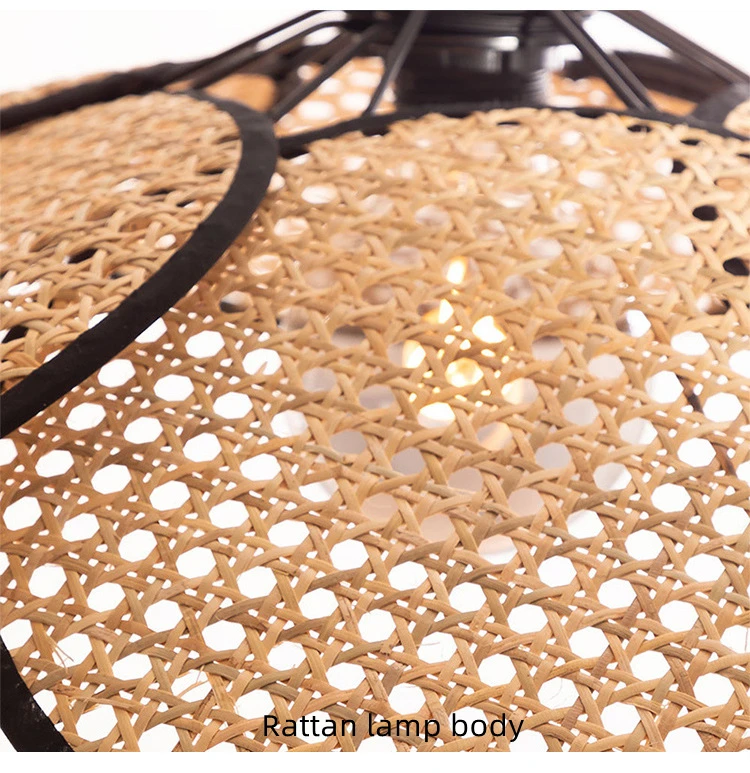 An organic meets modern rattan hanging light with a matte black shade.