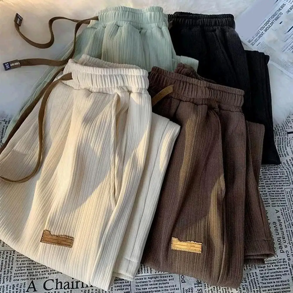 Description Picture 6 of itemMid-rise Elastic Waistband Men Pants Drawstring Pockets Ribbed Fast Drying Summer Ultra-thin Ice Silk Casual Trousers Streetwear