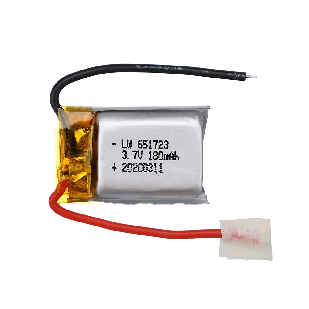 Plusieurs batteries de rechange pour hélicoptère RC disposées en rangée.