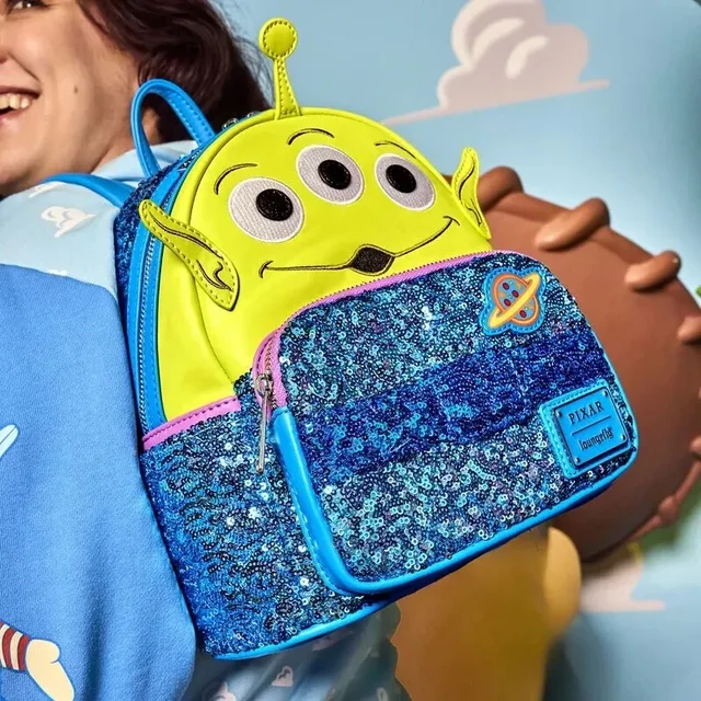 alien mini backpack Zoomer & Zorbit Glow Lisa Frank The Exclusive Loungefly Toy Story Alien Sequin Cosplay Mini Backpack takes your next adventure out of this world Toy Story Plush Backpack -