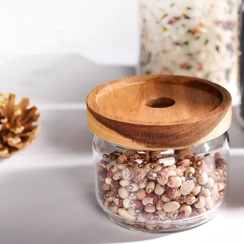 https://ae01.alicdn.com/kf/Safe491933de54a4b87acc3c1797dff71F/5-Pcs-Multi-Size-Glass-Sealed-Grain-Storage-Jars-with-Wooden-Lid-for-Coffee-Bean-Rice.jpg