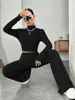 Stand Collar Navel T-shirt and Trumpet pants 4