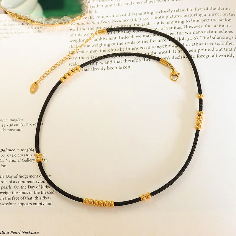Schwarze Stoffseil-Halskette mit Edelstahlperlen, Lolita-Modeaccessoire für Frauen, cooler Trend, Paar-Halsketten im Großhandel