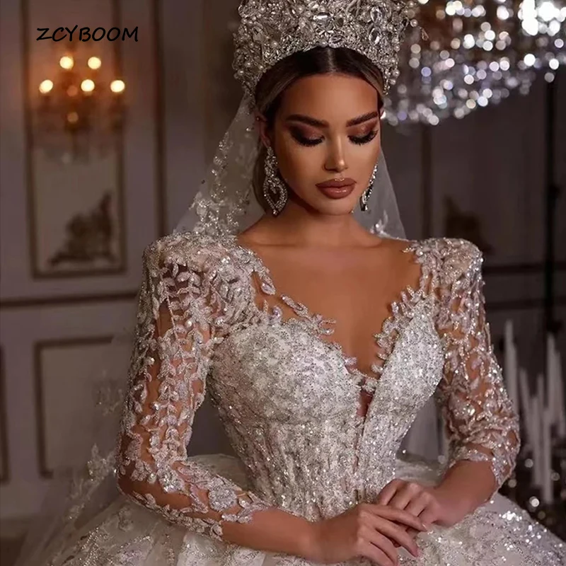 

Luxurious Muslim Sexy Long Sleeve Wedding Dresses Sparkly Appliques Exquisite Deep V-Neck Floor Length Bridal Ball Gowns Women‘s