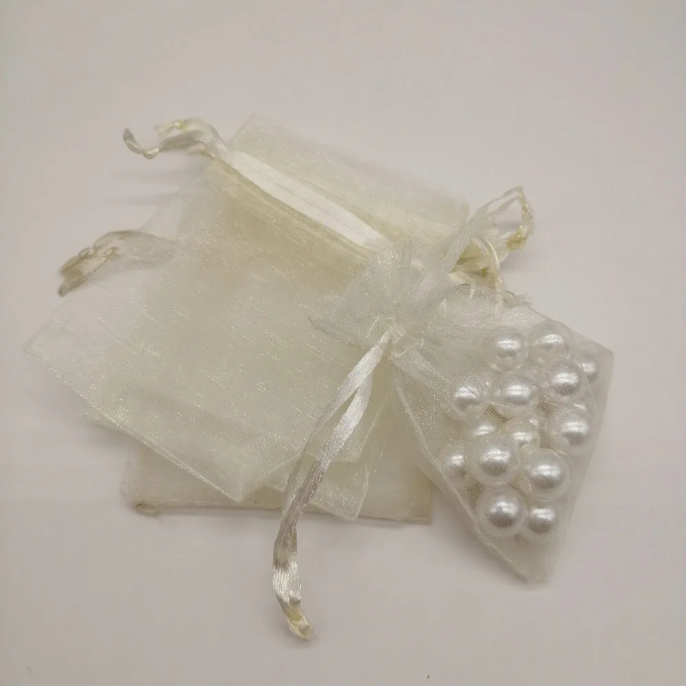 100pcs sacchetto regalo Beige sacchetti di immagazzinaggio di imballaggio di gioielli sacchetti regalo di Organza piccoli sacchetti di Organza con coulisse sacchetto di gioielli sacchetto bustina