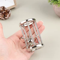 Hot Sale Classic Puzzle High IQ Cage Star Tooth Metal Brain Teaser Magic Baffling Puzzles Game Toys For Children Adults Gift 2