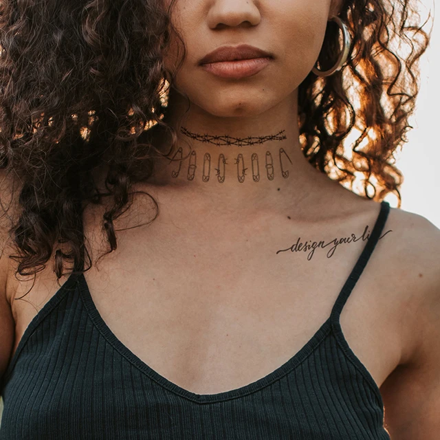 Person with Neck Tattoo Wearing Necklaces · Free Stock Photo