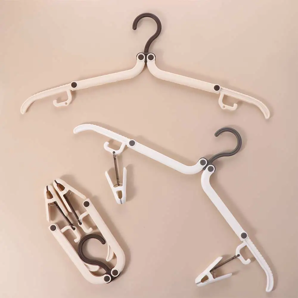 Description Picture 6 of item5Pcs Anti-slip Foldable Clothes Hanger Space Saving Windproof Clothes Drying Rack with 2 Clothespins Plastic Coat Hanger