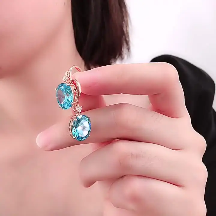 Серьги-подвески из розового золота 585 пробы с цирконом
