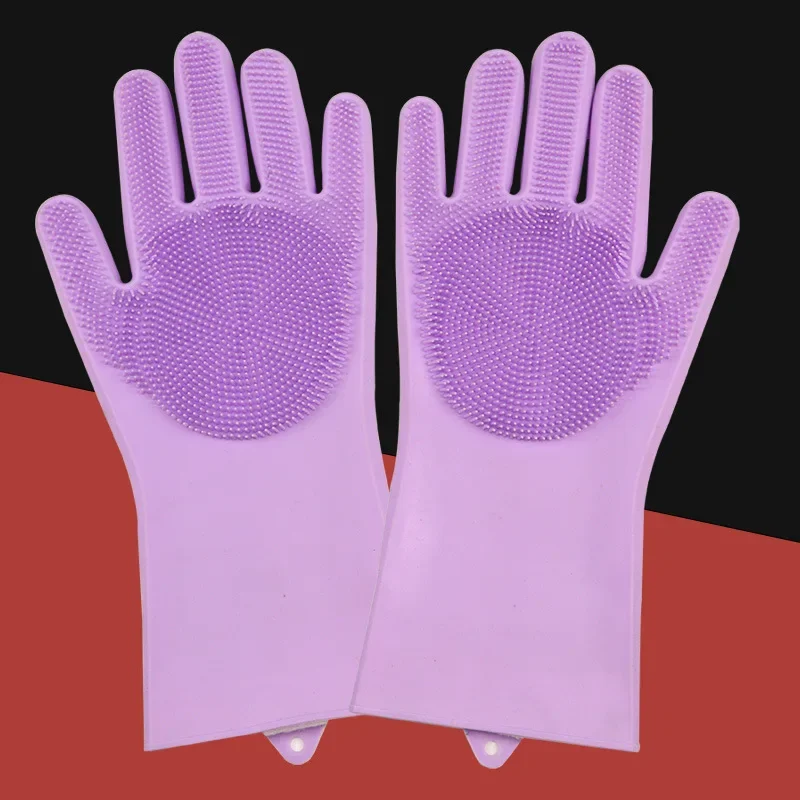 Dog being bathed with glove