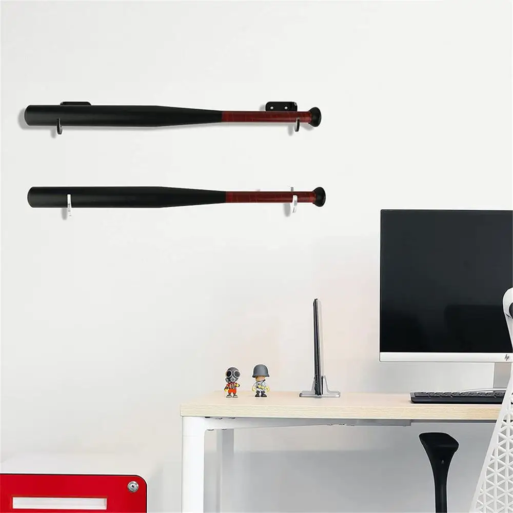 a two baseball bats on a wall