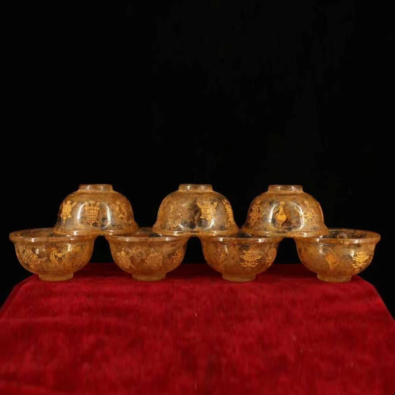 

Old crystal carving auspicious eight treasures unearthed in an ancient Tibetan temple (a set of water purification bowls)