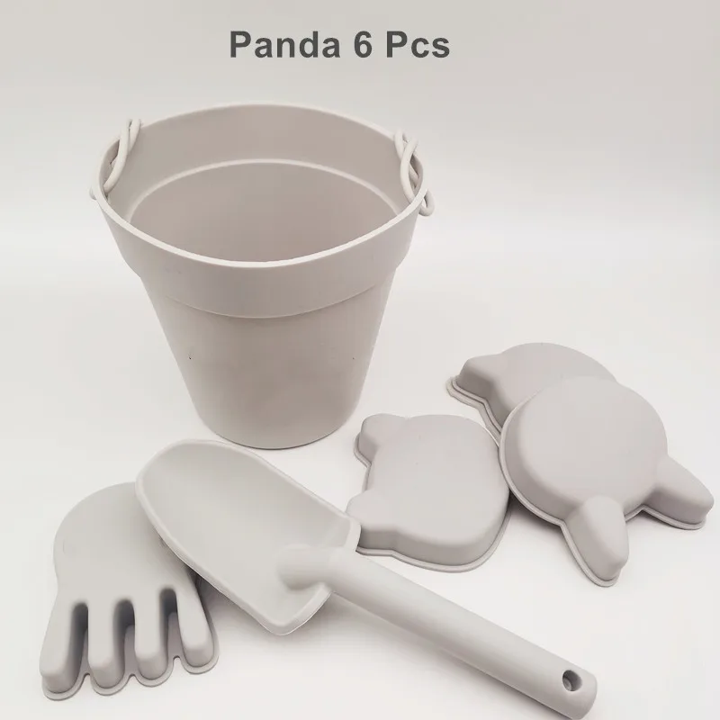 Set di giochi da spiaggia in silicone per bambini con secchiello_voghion.com