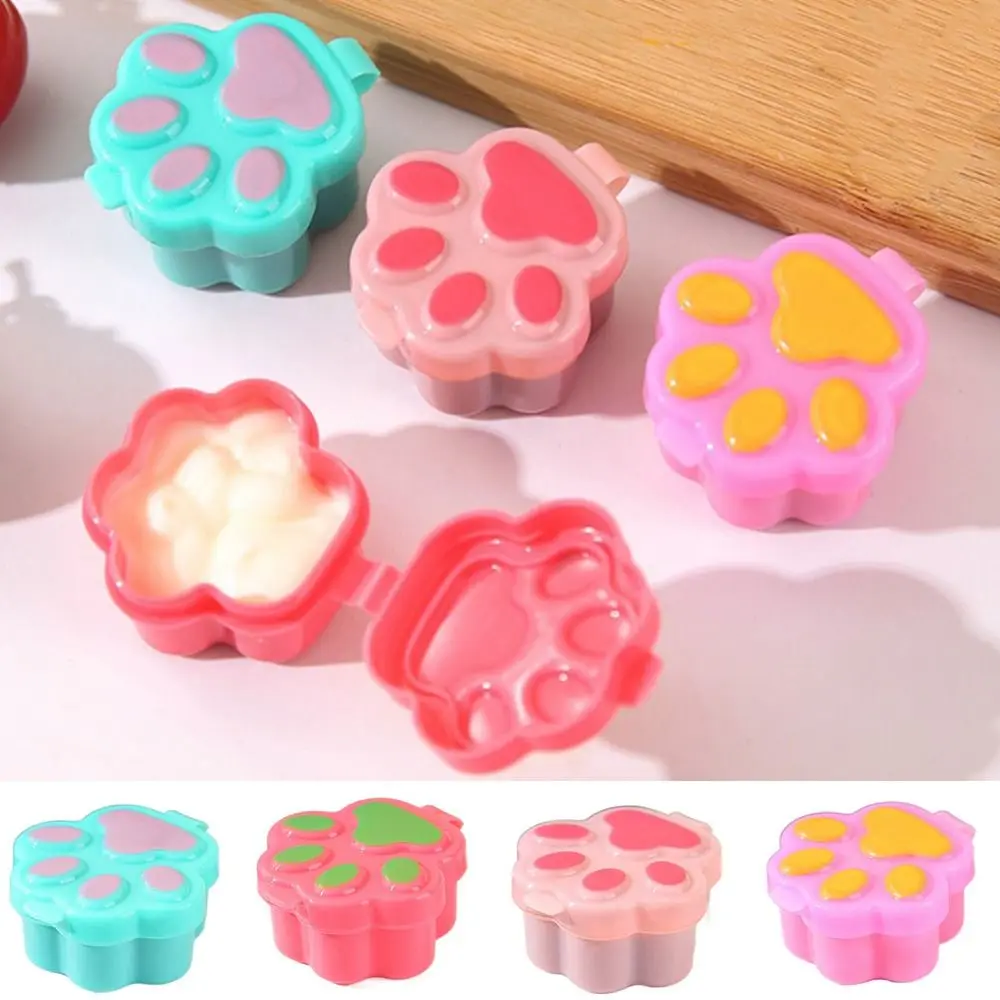 

Мультяшный соус в виде кошачьей лапы в бутылке